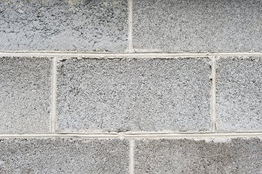 Duvar dokusu genişletilmiş kil bloklarını döşeme olduğunu. İnşaat malzemeleri reklam için arka plan. Yakın çekim gri beton köpük blok.