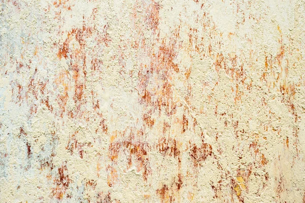 Fondo texturizado de pintura en escamas multicapa en la pared. Mezcla de diferentes colores de pinturas en las capas escindidas en la superficie. Textura grunge con un patrón profundo — Foto de Stock