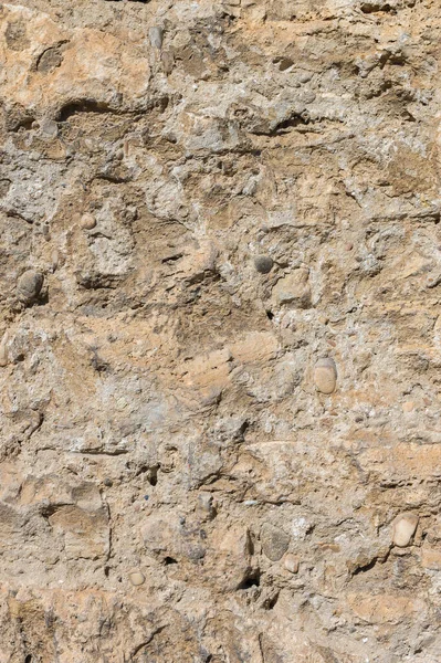 Ancient stone building mix of the exposed facade of the building during restoration. Grunge Abstract Background — Stock Photo, Image