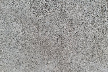 Gri desenli çimento duvar arkaplanı ve ince beton parçaları. İnşaat geçmişleri