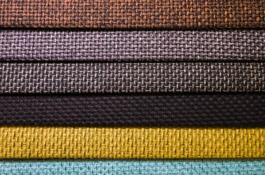 Soyut hacimli arka plan tekstil mobilya döşemelerinin çok renkli yatay çizgileri. Ev konforu