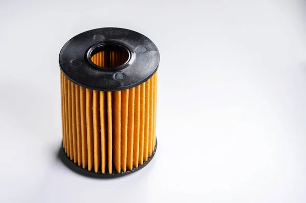 Replaceable cartridge fuel system. New fuel filter element on a gray gradient background — Stock Photo, Image