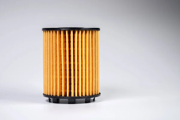 Elemen filter dari filter minyak baru. Suku cadang baru untuk mesin pembakaran internal. Sisipkan filter — Stok Foto