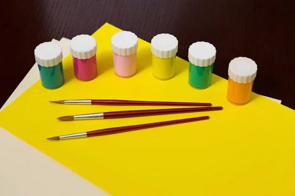 Various Art Supplies on a Wooden Desk — Stock Photo, Image