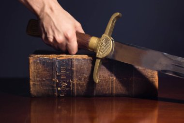 Young Athletic Man with His Bible and Sword
