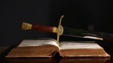 One Hundred Fifty Year Old Open Bible with Sword