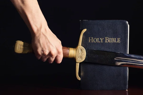 Young Athletic Man with His Bible and Sword — ストック写真