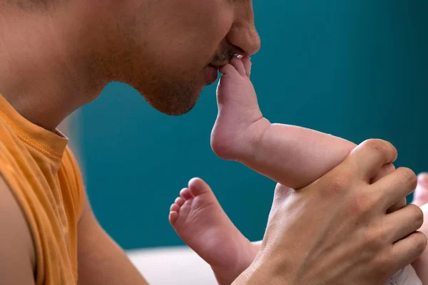 Emotional Dad Kissing His Brand New Baby Foot — Stock Photo, Image