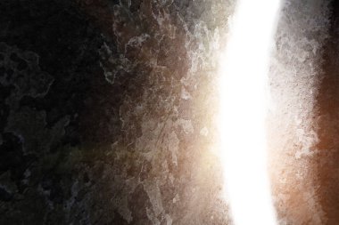 Dirilen İsa Mesih 'in boş mezarından parlak bir ışık geliyor. 