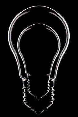 siyah arka plan üzerine izole ampul kavramı