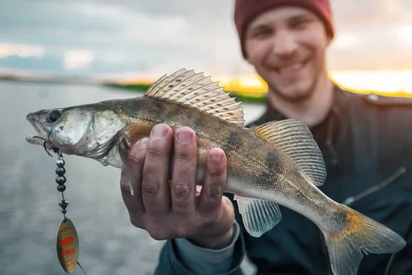Happy Fisherman Holds Fish — Stock Photo, Image