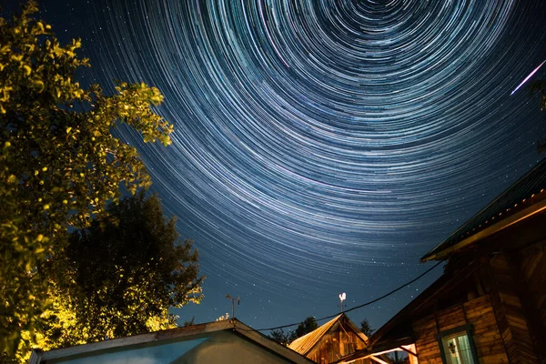 Starry Sky Star Trails Wooden Buildings — Stock Photo, Image