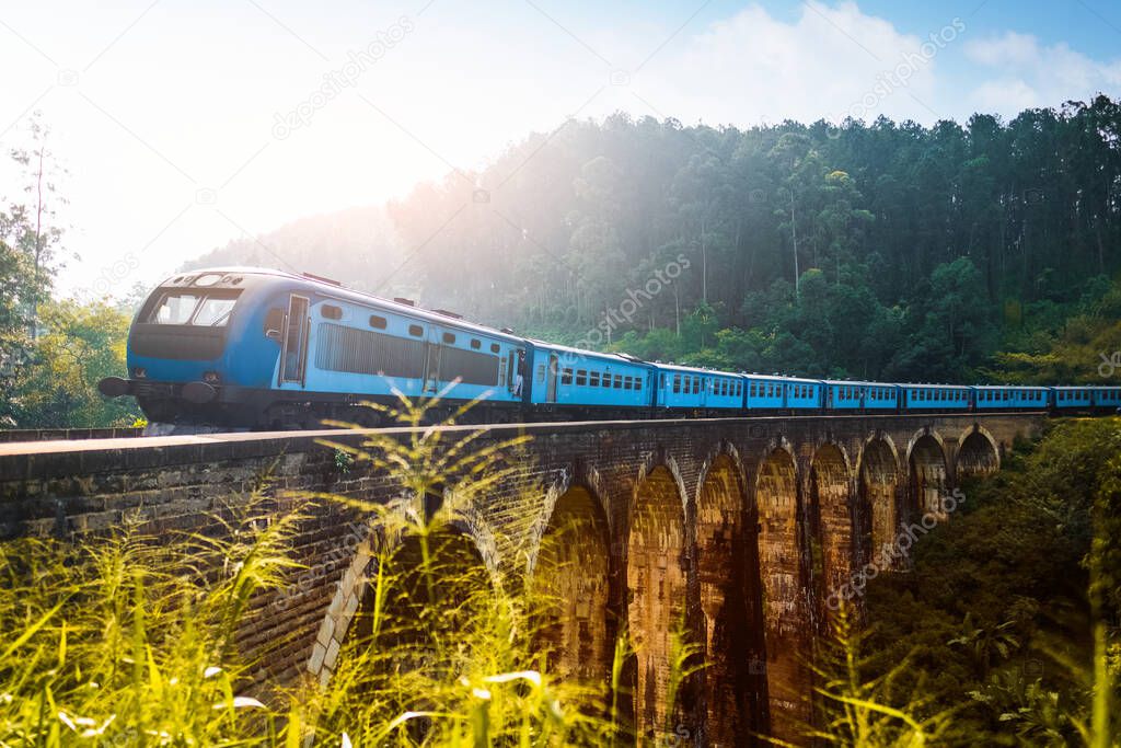 Train passing viaduct named Nine Arches Bridges near the town of Ella, Sri Lanka