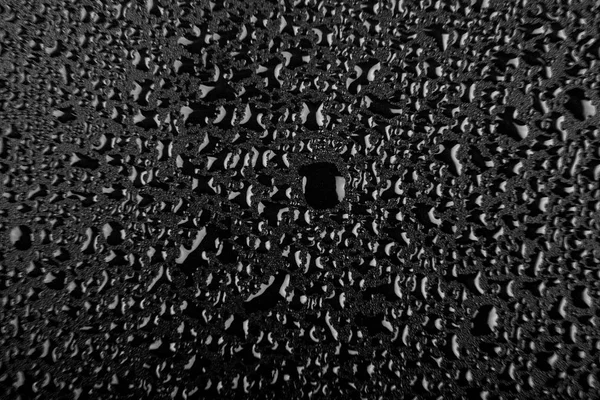 Water drops on black background closeup — Stock Photo, Image
