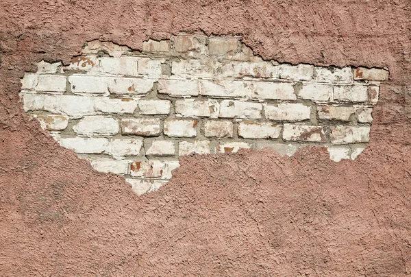 Ziegelwand mit abblätterndem Putz — Stockfoto