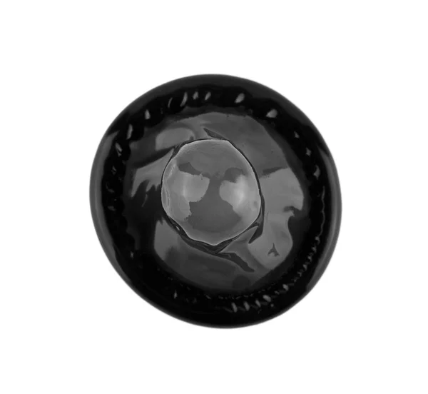 Чорний презерватив ізольований на білому фоні крупним планом — стокове фото