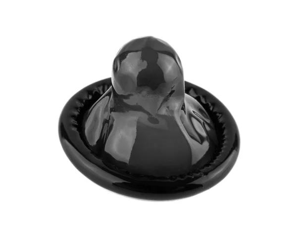 Zwart condoom geïsoleerd op een witte achtergrond closeup — Stockfoto