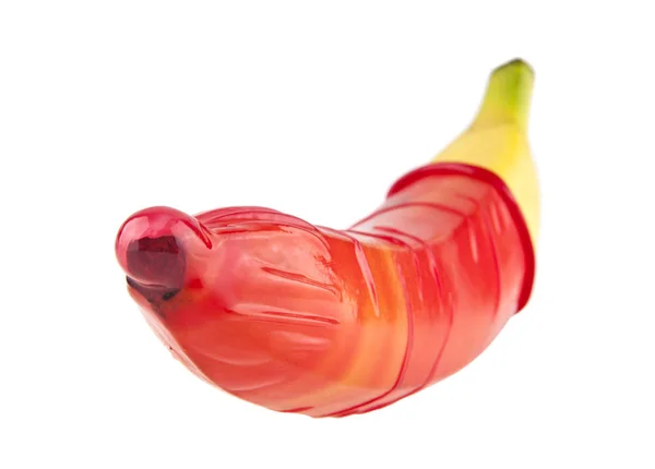 红色的避孕套和一根香蕉 — 图库照片