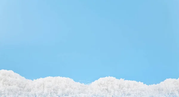 White snow on a blue background — Stock Photo, Image