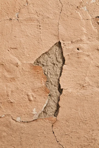 Vieux mur avec plâtre fissuré surface texturée — Photo