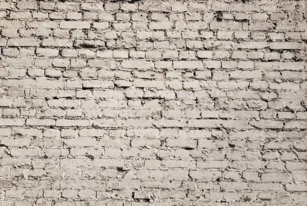 Oude bakstenen muur met een geborsteld oppervlak — Stockfoto