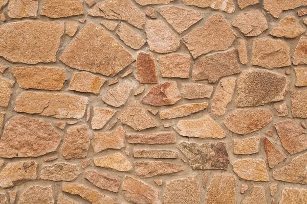 Zeď z kamenů se strukturovaným povrchem — Stock fotografie