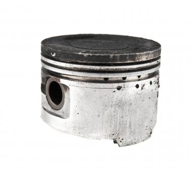 Beyaz arka plan üzerinde eski piston 