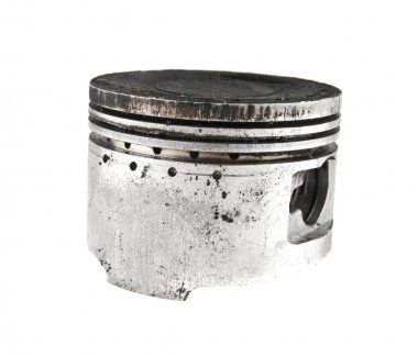 Beyaz arka plan üzerinde eski piston 