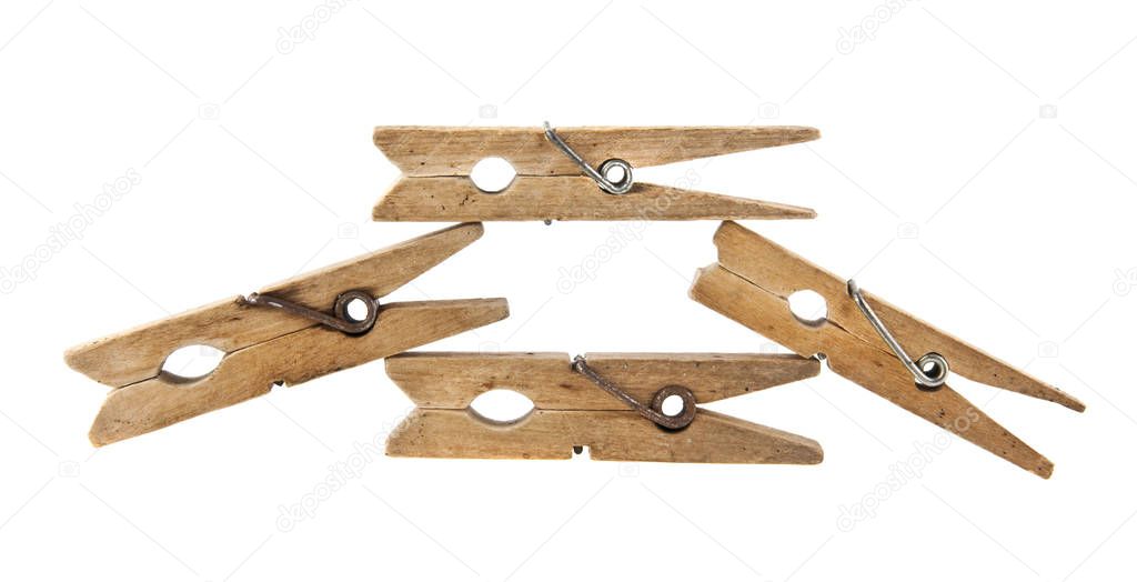 wooden clothespin isolated on white background closeup