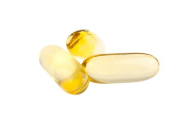 beyaz zemin üzerine hap kapsül 