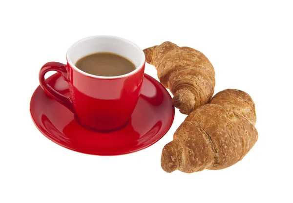 Röd kaffekopp och croissant — Stockfoto