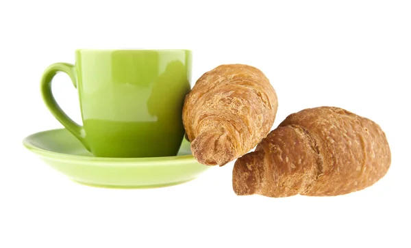 绿色咖啡杯和牛角面包 — 图库照片
