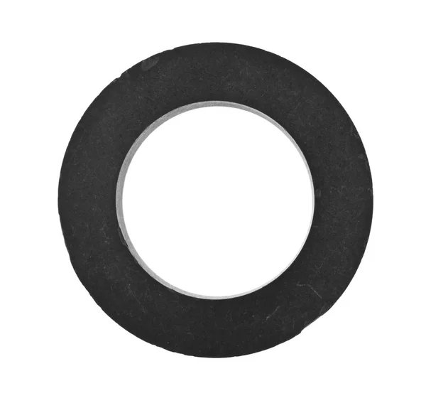 Ферритовое кольцо на белом фоне — стоковое фото