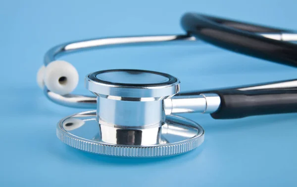 Stethoscope on a blue background closeup — Stock Photo, Image