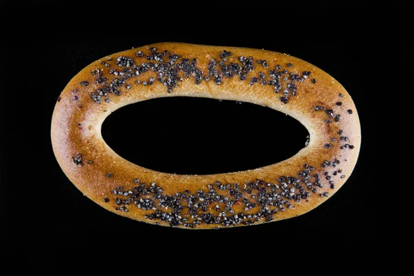 Siyah arkaplanda simit — Stok fotoğraf