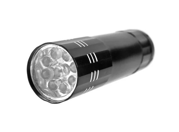Black flashlight on white background — Stock Photo, Image