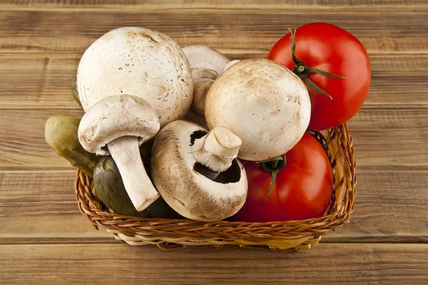 Tomatoes, cucumbers and mushrooms — Stock Photo, Image