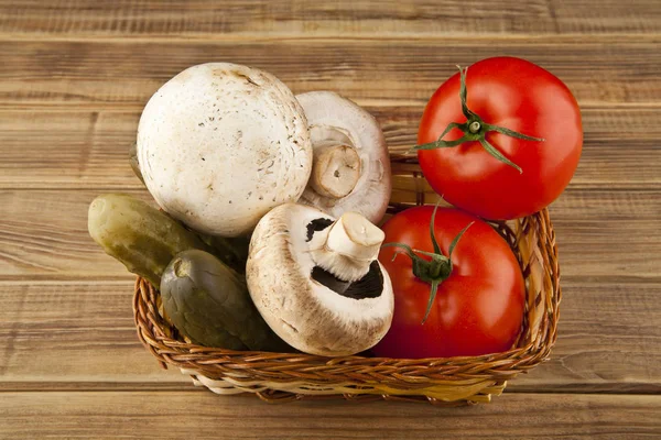 Tomatoes, cucumbers and mushrooms — Stock Photo, Image