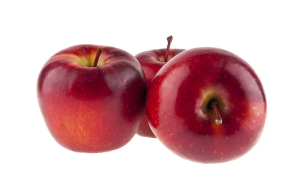 Röda äpplen på vit bakgrund — Stockfoto