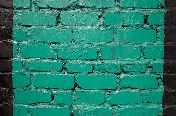 Pared de ladrillo viejo pintado en color verde —  Fotos de Stock