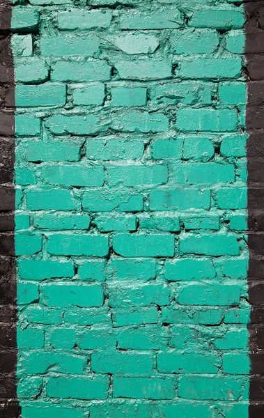 Pared de ladrillo viejo pintado en color verde —  Fotos de Stock
