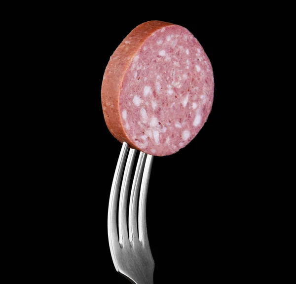 Sausage on a fork Stock Photo