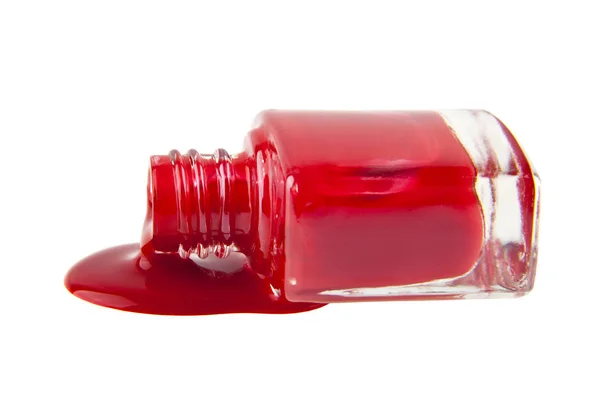 Fles met rode nagellak geïsoleerd op witte achtergrond — Stockfoto