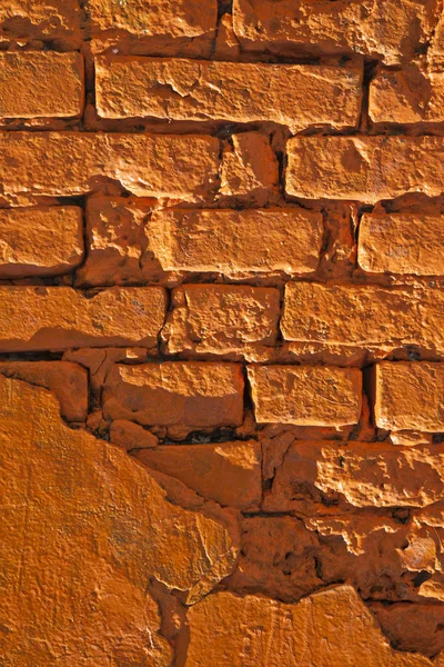 背景のクローズ アップとして古いオレンジ色のレンガの壁 — ストック写真
