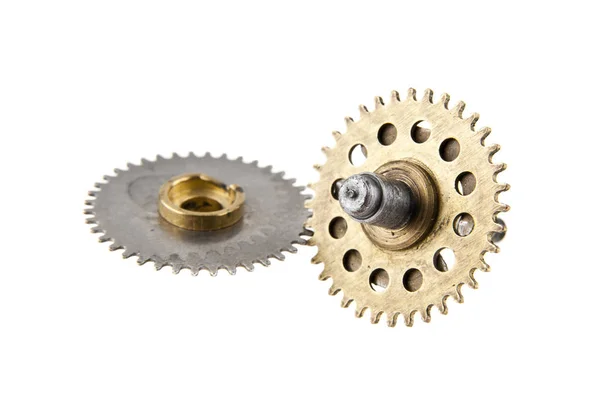 Gears for a clock isolated on a white background close-up — Stock Photo, Image