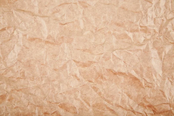 Brown wrinkled paper as background — Stock Photo, Image