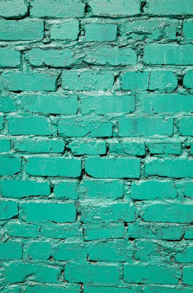 Textura de una pared de ladrillo verde como fondo —  Fotos de Stock