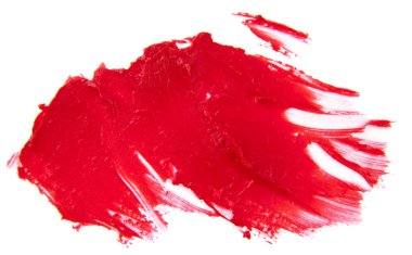 Beyaz arkaplanda lekeli kırmızı ruj izole edildi