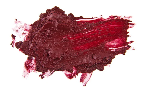 Frottis de rouge à lèvres rouge isolé sur fond blanc — Photo