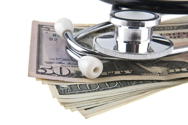 Dollars and a stethoscope isolated on a white background — Stock Photo, Image